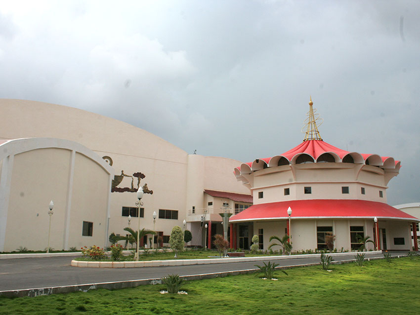 Devotees gathered in the darshan hall.